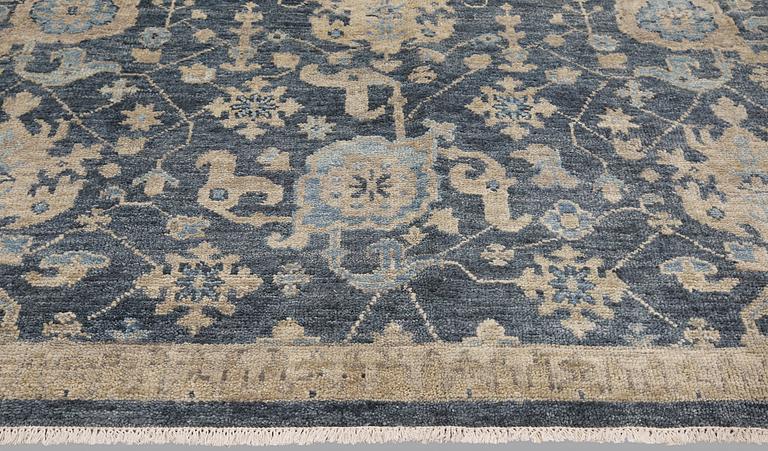 A oriental carpet, ca 373 x 269 cm.