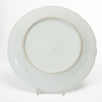 A group of three armorial dinner plates, presumably France, late 19th century.