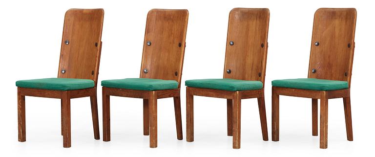 A set of four chairs and two armchairs by Axel Einar Hjorth, Nordiska Kompaniet, Stockholm 1930's.