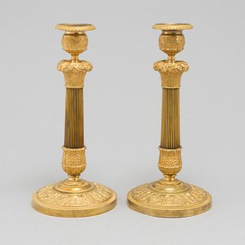 CANDLESTICKS, a pair, Empire, France, first half of the 19th century.