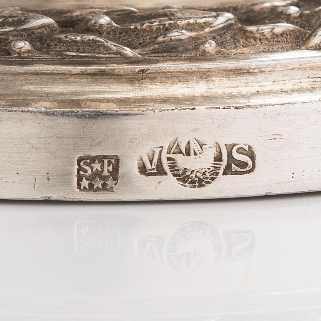 A pair of Saglier Frères silver plated Louis XVI-style candlesticks from around year 1900.