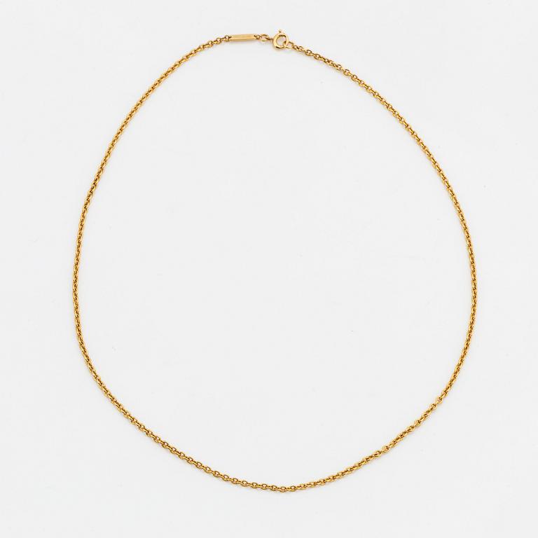 Cartier, an 18K gold necklace.