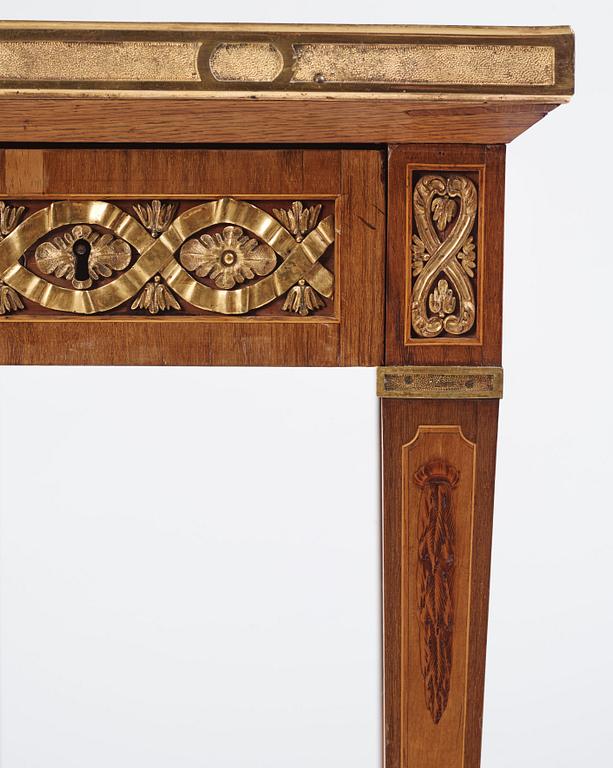 A Gustavian marquetry, ormolu-mounted, and marble table by G. Iwersson (master in Stockholm 1778-1813), signed 1781.