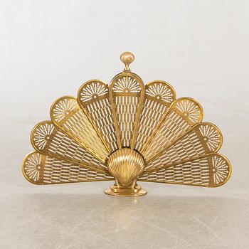 A brass fire screen later part of the 20th century.