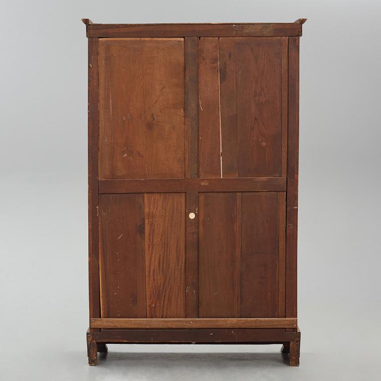A French Empire mahogany and gilt-bronze mounted bibliothèque, early 19th century.