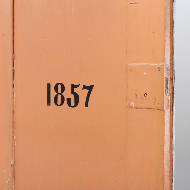 An 19th Century corner cabinet.