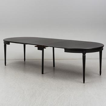 A late 20th Century painted table.