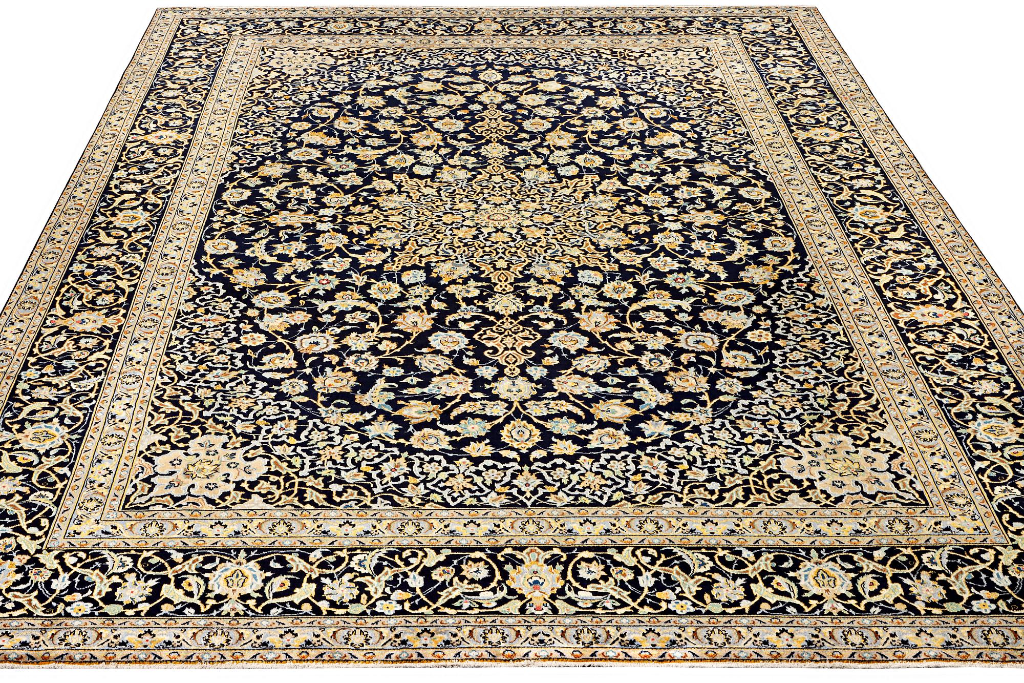 A Keshan carpet, c. 422 x 306 cm.