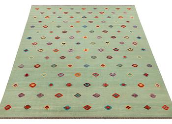 An Afghan kelim rug, c. 292 x 204 cm.