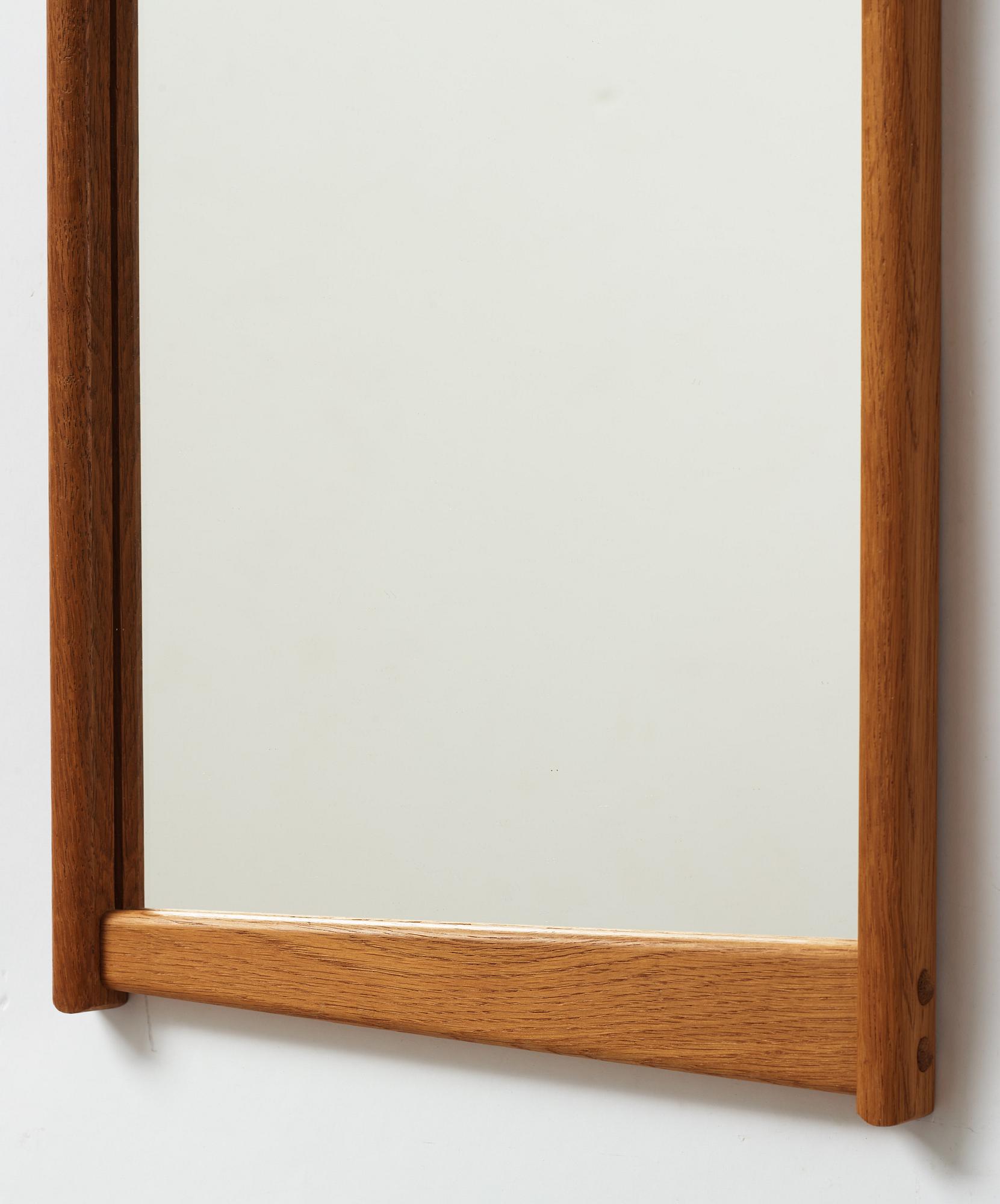 A oak mirror, 1950's/60's.