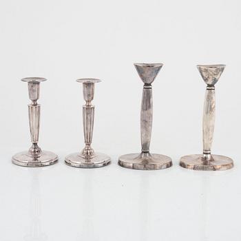 A group of four silver candlesticks, including GAB Eskilstuna, Sweden, 1976.