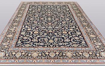 A carpet, Kashan, ca 355 x 238 cm.