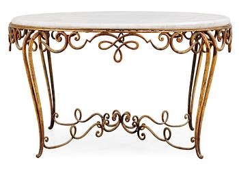 508. A marble top table with gilt metal base, attributed to René Drouet, France 1940's.