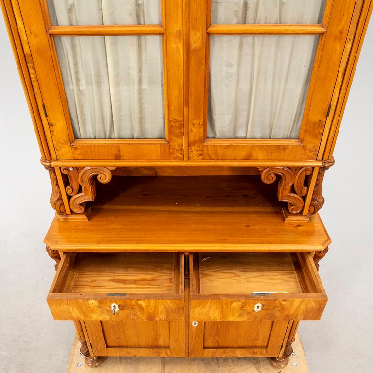 A Neo Rococo elm mid 1800s display cabinet.
