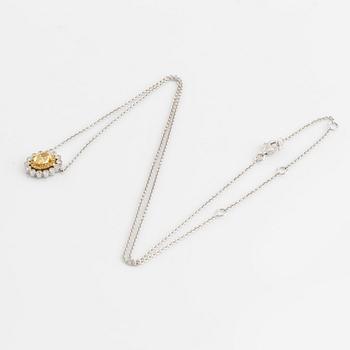 Oval cut yellow diamond and brilliant cut diamond necklace.
