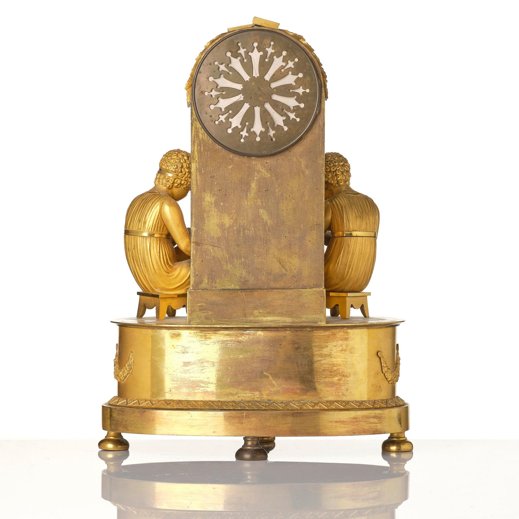 A French Empire ormolu mantel clock, early 19th century.