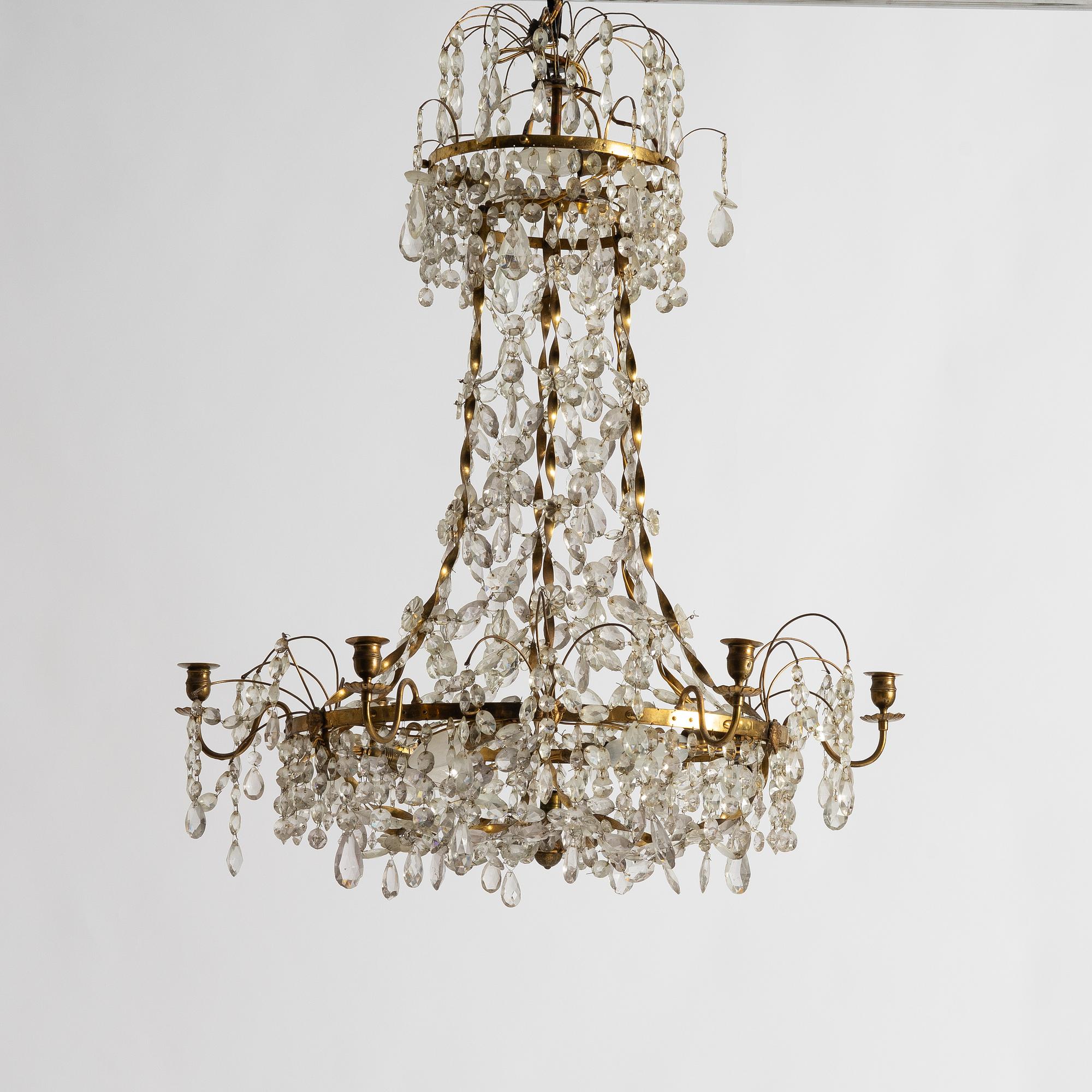 A late Gustavian gilt brass and cut glass seven-light chandelier, Stockholm, late 18th century.