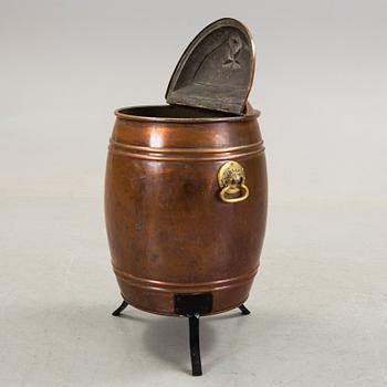 An early 20th century copper barrel.