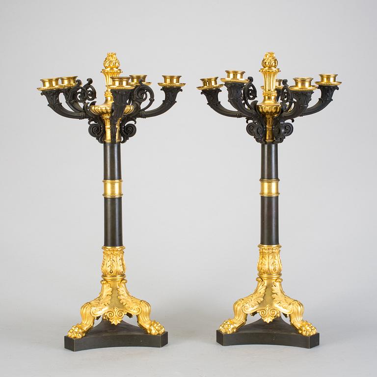 A pair of late Empire five-light candelabra in bronze from the middle of the 19h Century.