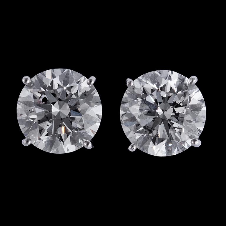 A pair of brilliant cut diamond studs, 2.40 cts resp 2.27 cts.