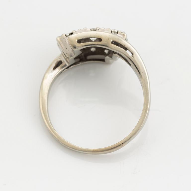 A 14K gold ring set with diamonds.