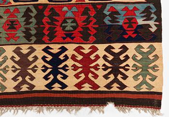 An antique Central Anatolian kilim, c. 273 x 101 cm.