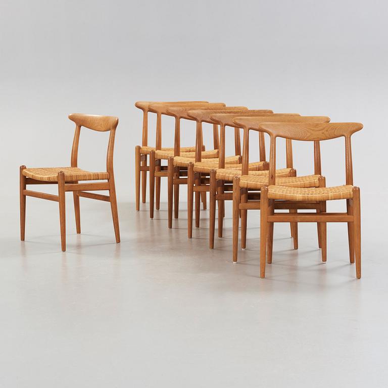 Hans J. Wegner, A set of eight oak chairs by Carl Madsen, Denmark 1950-60's.