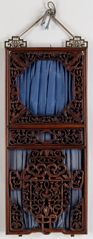 A Chinese carved hardwood panel/window, 20th century.