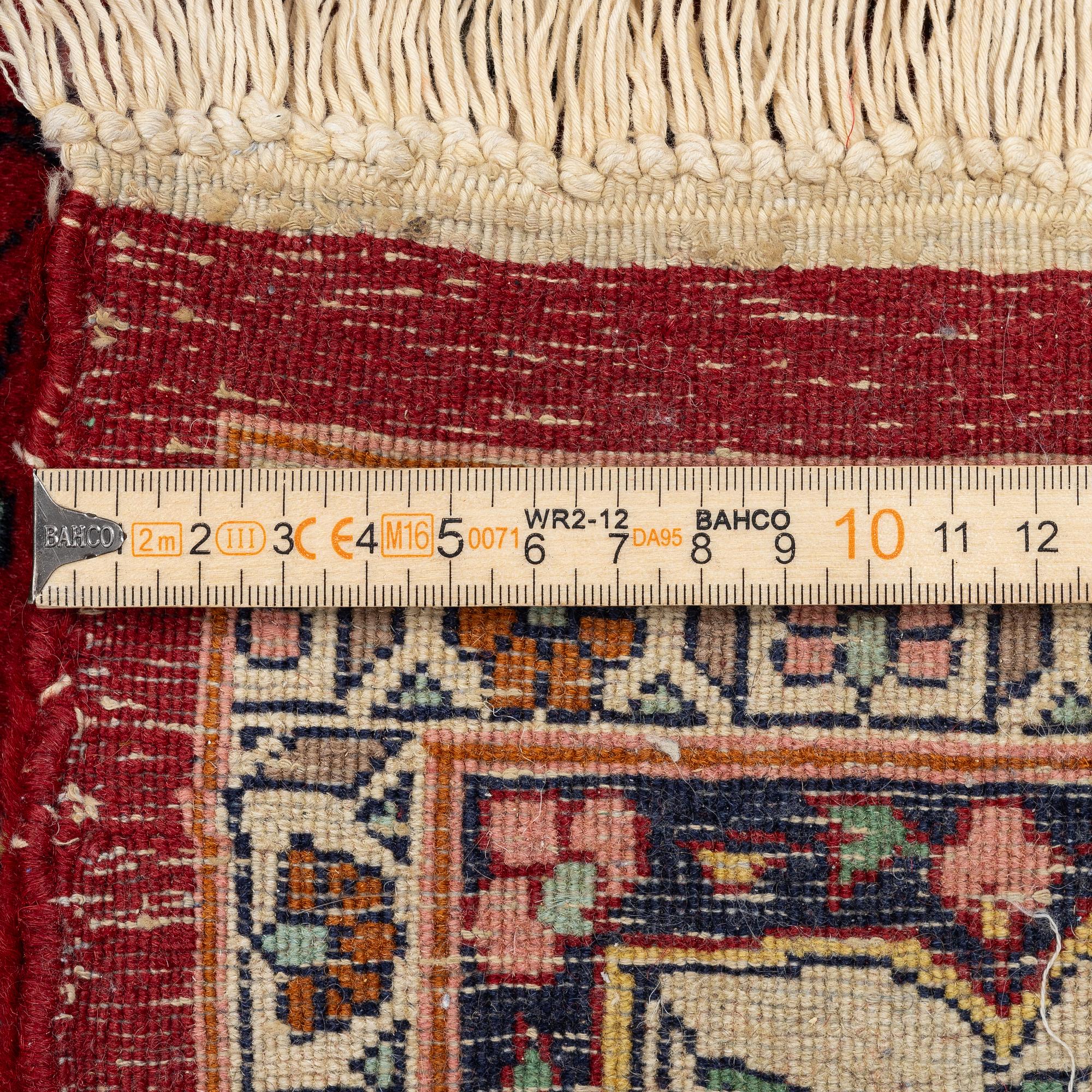 Carpet, Tabriz, with hunting motif. 220 x 140 cm.