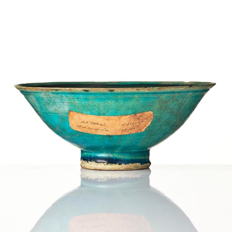 A conic Kashan pottery bowl, central Persia, 11th century.