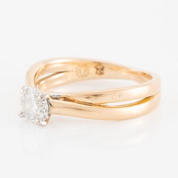 Ring 18K gold set with a round brilliant-cut diamond, by Or Du Monde Paris.