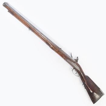 Flintlock rifle, 18th century.
