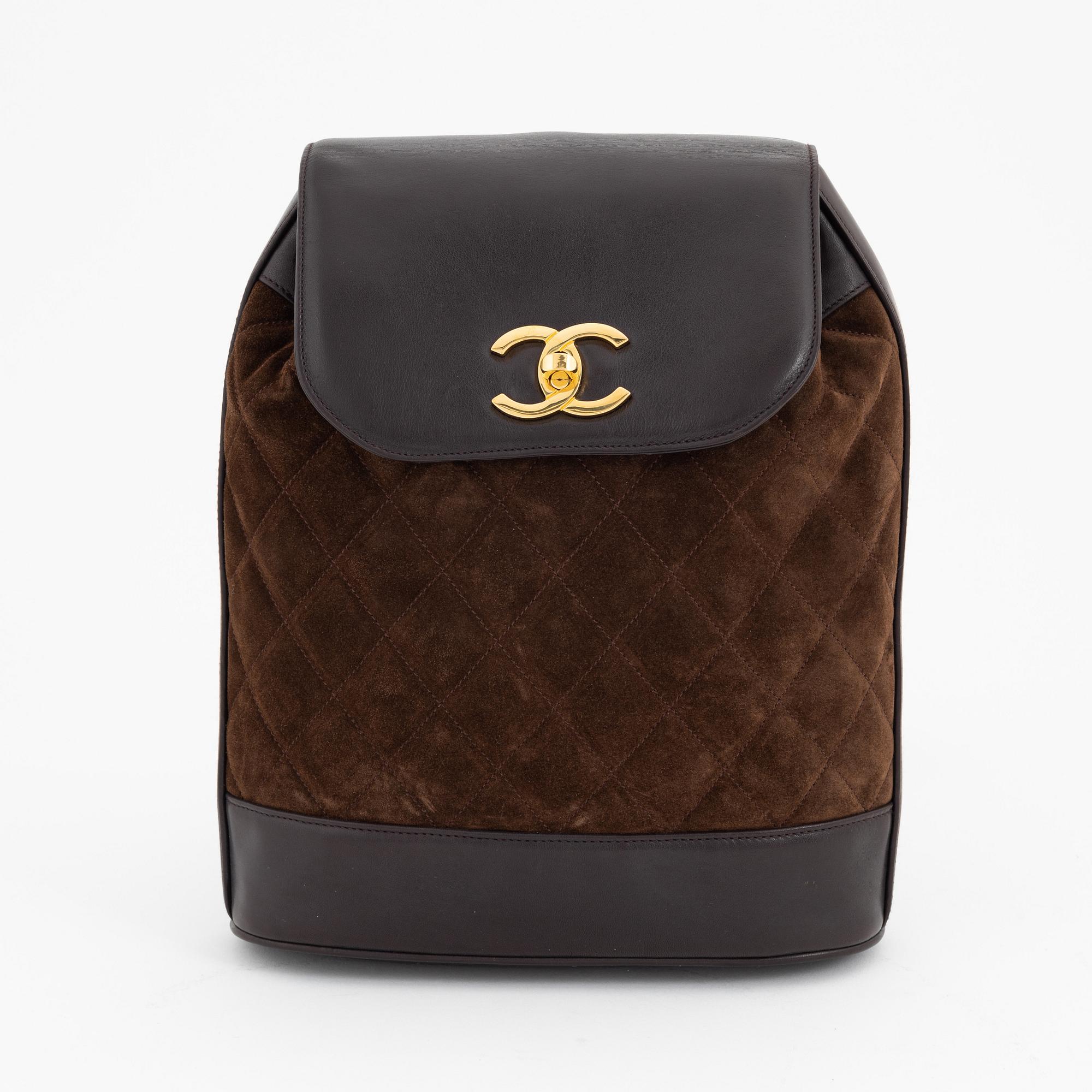 Chanel, a brown suede and leather one strap backpack/sholder bag, 1991-1994.