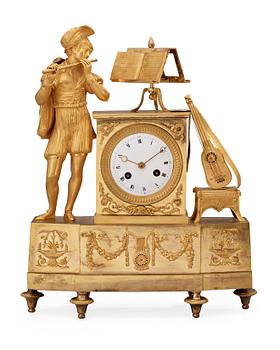 798. A French Empire early 19th century gilt bronze mantel clock.