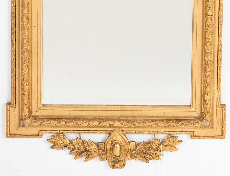 Spegel, gustaviansk stil, omkring 1900.