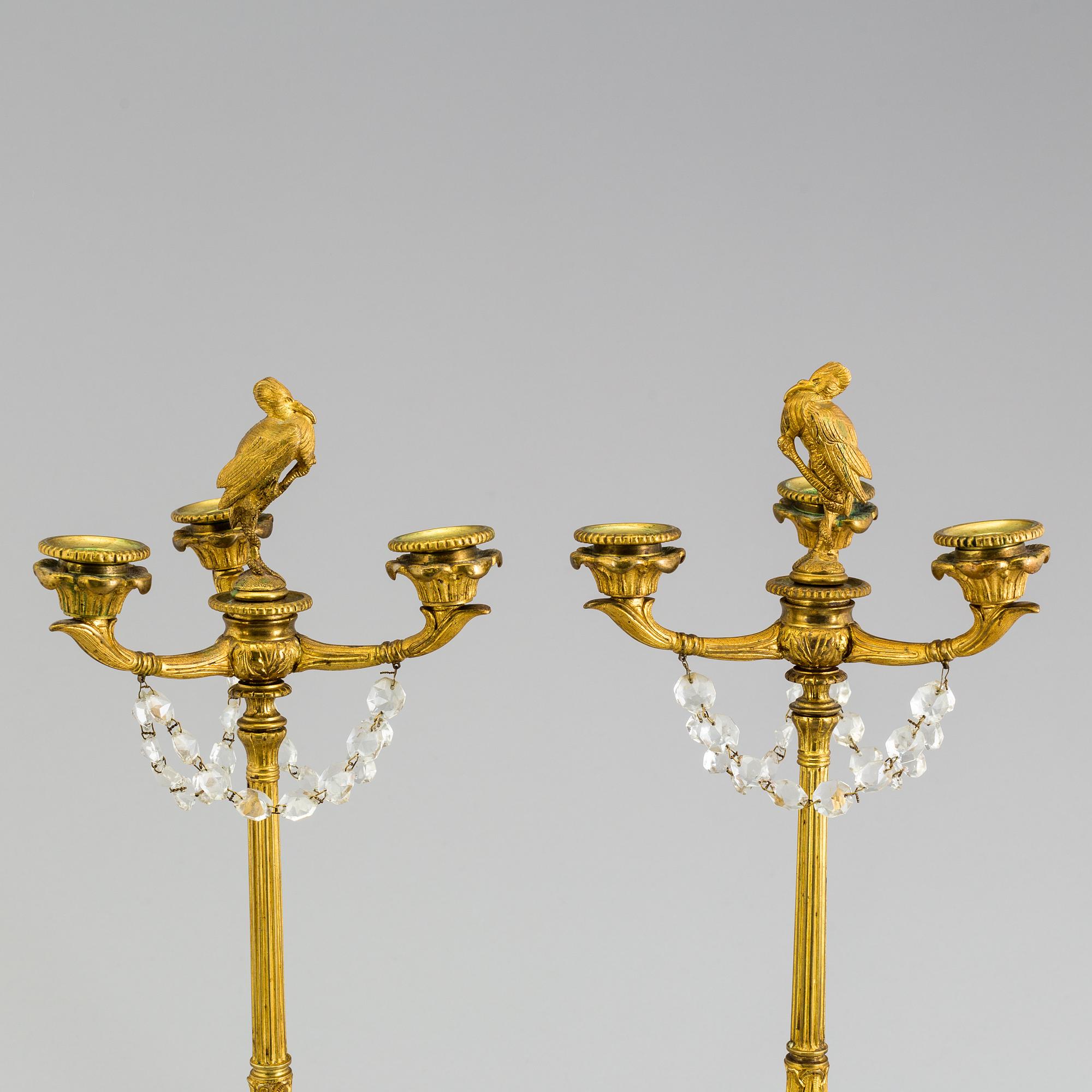 A pair of neorenaissance candelabras, about 1900.