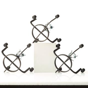 Gunnar Ander, a set of three iron and glass candlesticks for Ystad Metall, Sweden, mid 20th century.