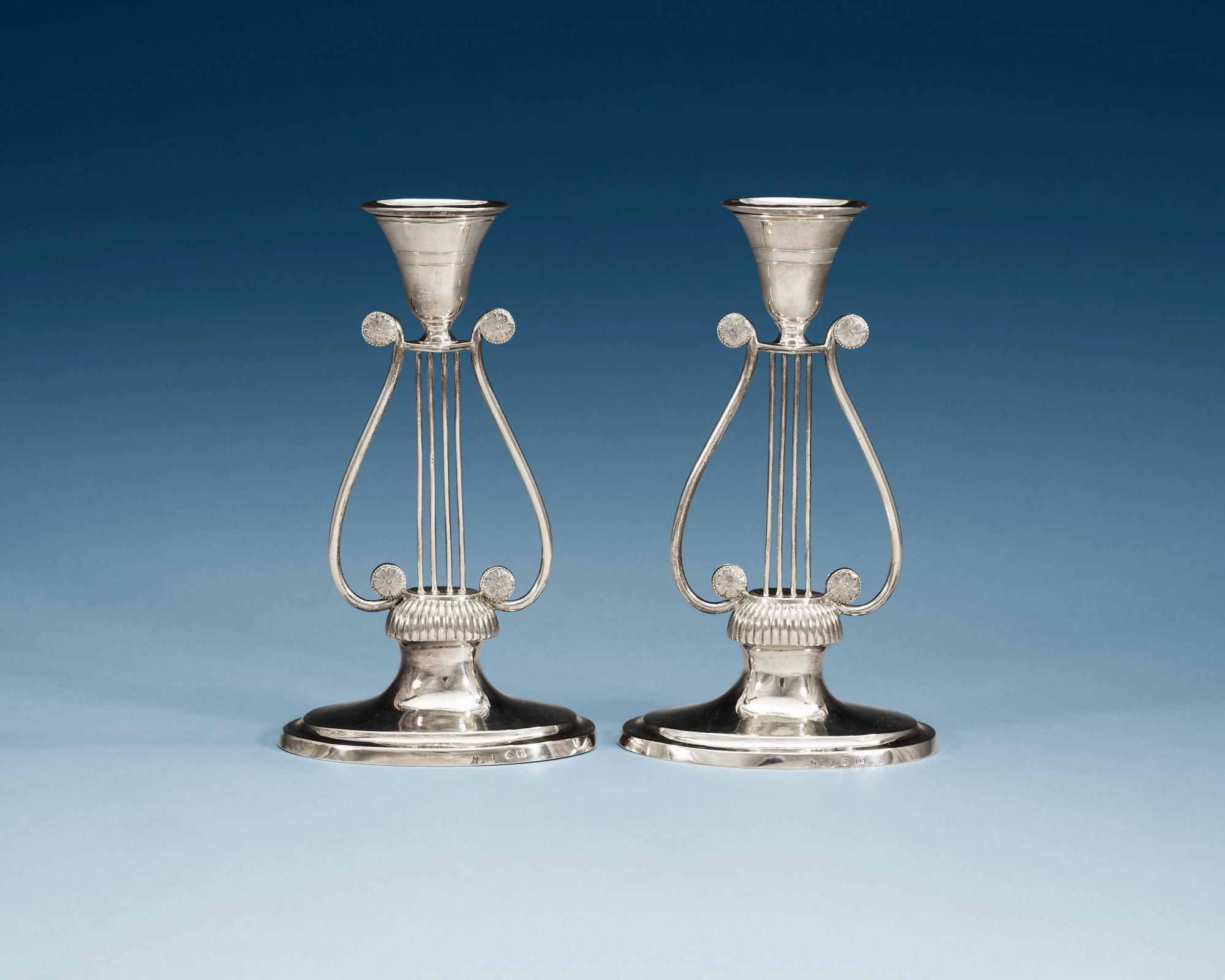 A pair of Swedish 19th century silver candlesticks, makers mark of Olof H. Bergström, Uppsala 1819.