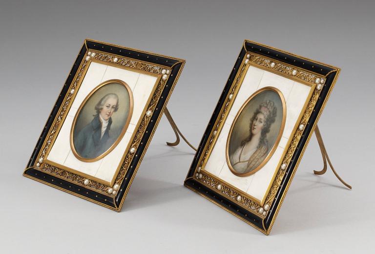 Man- och kvinnoporträtt.