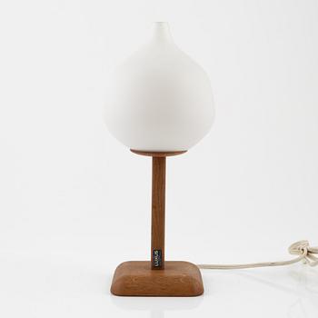 Uno & Östen Kristiansson, an oak and glass table light, Luxus, Vittsjö, mid 20th Century.