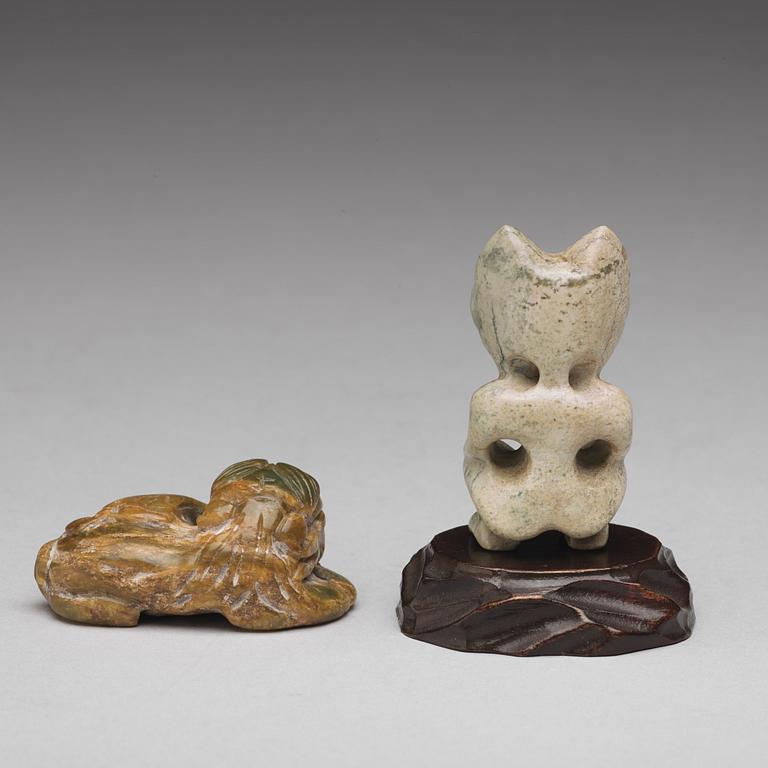 Two archaistic stone sculptures.
