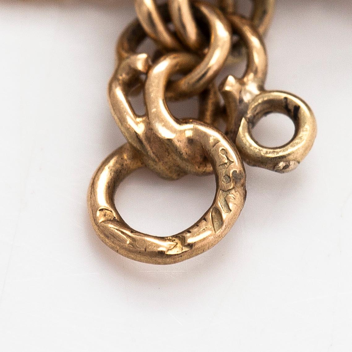 Armband, bismarck ked, 14K guld, med berlocker i form av ägg, Finska stämplar.