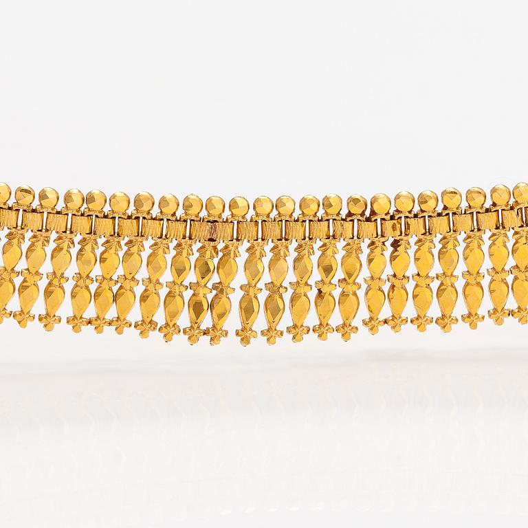 Halsband, armband och örhängen, 14-21K guld.