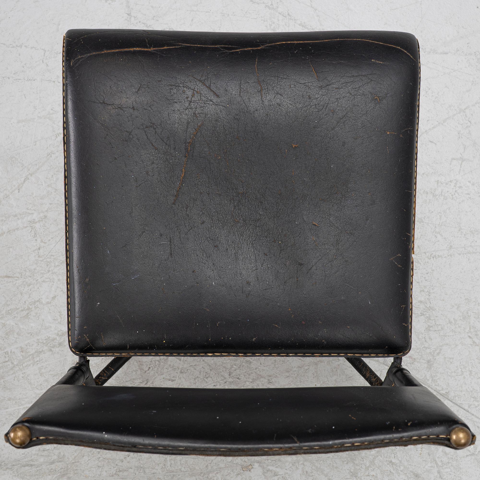 Jacques Adnet, attributed to, chairs, a pair, France, mid-20th century.