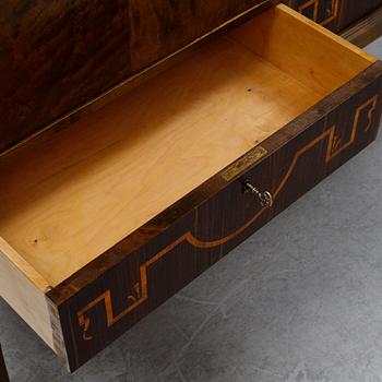 A 1920's-30's Swedish Grace birch and rosewood veneered cabinet.