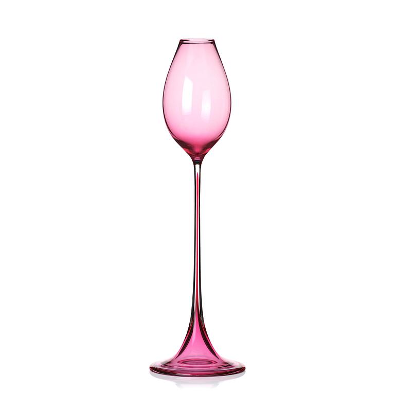 Nils Landberg, a cerise tinted glass goblet, Orrefors Sweden 1957.