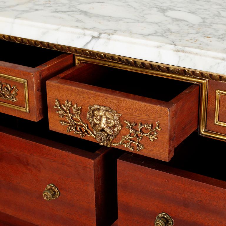 A Louis XVI style chest of drawers, second half of the 20th century.