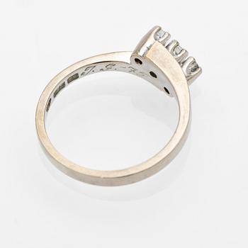 18K white gold ring with diamonds.