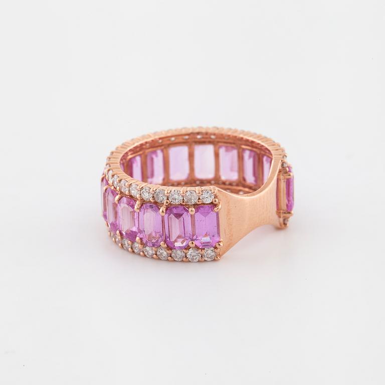 An emerald cut pink sapphire and brilliant cut diamond ring.