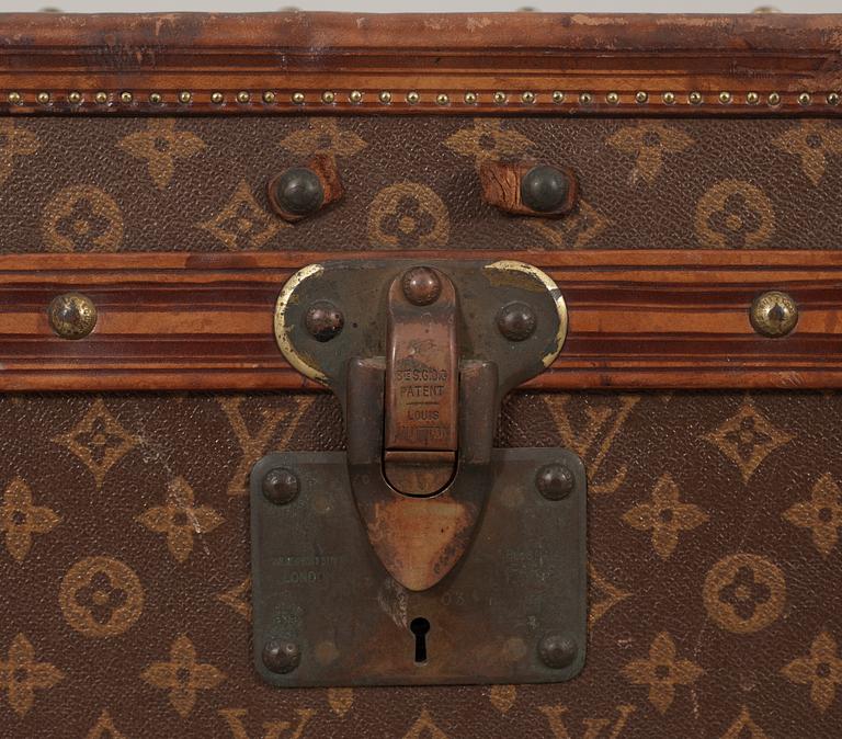 An early 20th cent monogram canvas trunk by Louis Vuitton.
